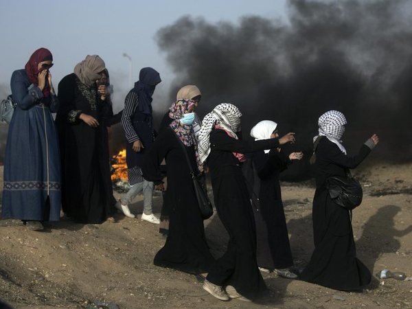 Palestinian women attend a protest at the Gaza Strips border with Israel, Friday, May 18, 2018. (AP/PTI Photo) Palestinian women attend a protest at the Gaza Strips border with Israel, Friday, May 18, 2018. (AP/PTI Photo)
