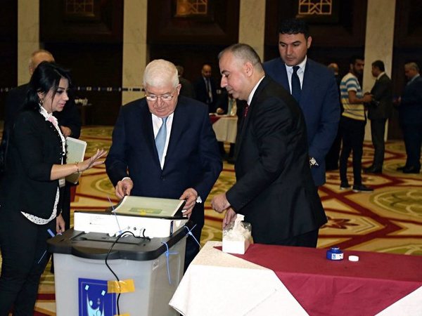 Iraqi President Fuad Masum, center, casts his vote in the countrys parliamentary elections in the heavily fortified Green Zone in Baghdad, Iraq, Saturday, May 12, 2018. Polls opened across Iraq on Saturday in the first national election since the declaration of victory over the Islamic State group. AP/PTI Iraqi President Fuad Masum, center, casts his vote in the countrys parliamentary elections in the heavily fortified Green Zone in Baghdad, Iraq, Saturday, May 12, 2018. Polls opened across Iraq on Saturday in the first national election since the declaration of victory over the Islamic State group. AP/PTI