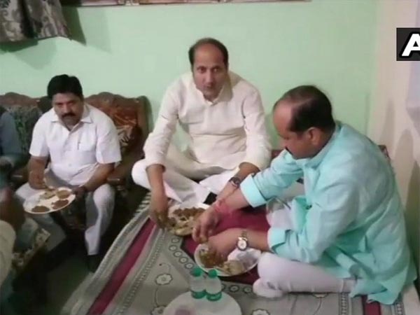 UP minister triggers row after taking own food, water for dinner hosted at Dalit household UP minister triggers row after taking own food, water for dinner hosted at Dalit household