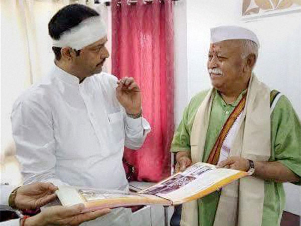 RSS chief Mohan Bhagwat meeting spiritual leader Bhayyuji Maharaj in Indore. PTI file photo RSS chief Mohan Bhagwat meeting spiritual leader Bhayyuji Maharaj in Indore. PTI file photo