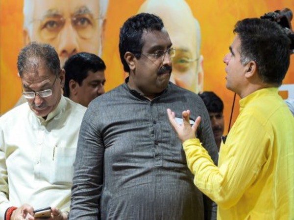 Ram Madhav with the state Dy Chief Minister Kavinder Gupta (L)