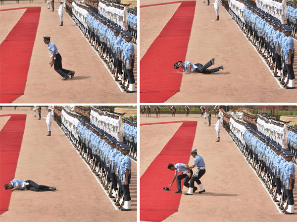 A member of the Indian Air Force, on Guard of Honour duty, faints during the ceremonial reception of Seychelles President Danny Antoine Rollen Faure at Rashtrapati Bhawan, in New Delhi A member of the Indian Air Force, on Guard of Honour duty, faints during the ceremonial reception of Seychelles President Danny Antoine Rollen Faure at Rashtrapati Bhawan, in New Delhi