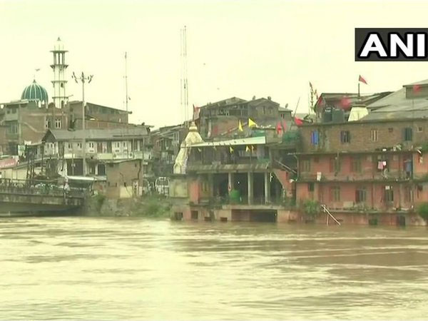 Jhelum river crosses danger mark. Courtesy: ANI news Jhelum river crosses danger mark. Courtesy: ANI news