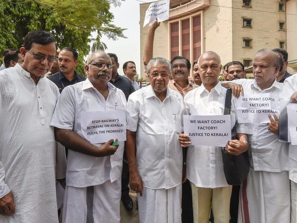 Kerala Chief Minister Pinarayi Vijayan along with his party MPs during their protest asking the Centre to withdraw its decision to abandon the much-awaited railway coach factory project planned at Kanjikode in Palakkad, in New Delhi on Friday, June 22, 2018. PTI file photo Kerala Chief Minister Pinarayi Vijayan along with his party MPs during their protest asking the Centre to withdraw its decision to abandon the much-awaited railway coach factory project planned at Kanjikode in Palakkad, in New Delhi on Friday, June 22, 2018. PTI file photo