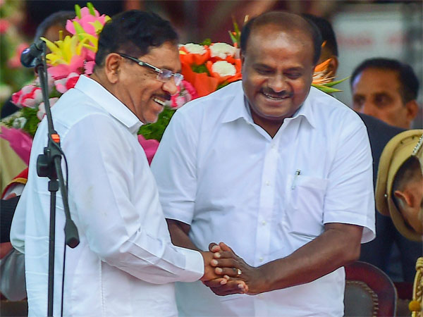 Karnataka Chief Minister and JD(S) leader H D Kumaraswamy greets Deputy Chief Minister Dr Parameshwar Karnataka Chief Minister and JD(S) leader H D Kumaraswamy greets Deputy Chief Minister Dr Parameshwar