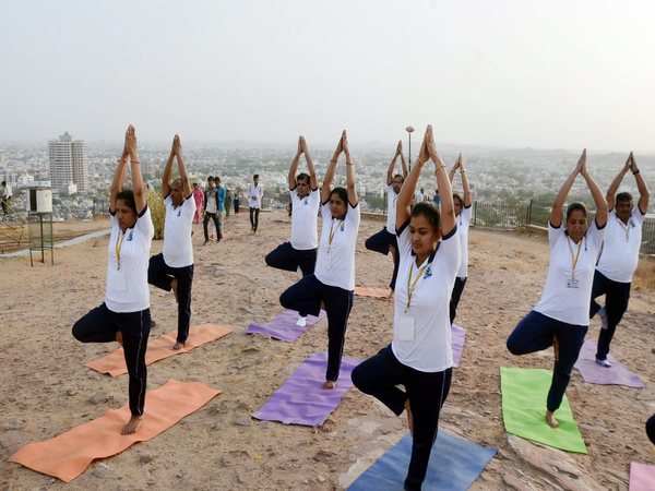 Yoga enthusiasts perform yoga ahead of International Day of Yoga 2018 in Jodhpur