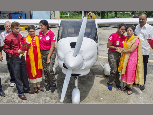 Pilot being greeted by parents
