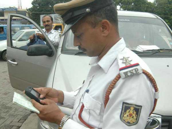 Auto driver charged Rs 700 for not wearing helmet Auto driver charged Rs 700 for not wearing helmet