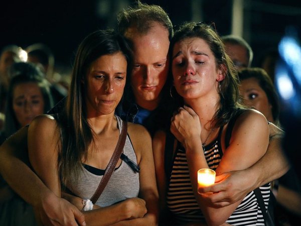 Mallory Cunningham, left, Santino Tomasetti, center, and Aubrey Reece attend a candlelight vigil in the parking lot of Ride the Ducks Friday, July 20, 2018, in Branson, Mo. One of the companys duck boats capsized Thursday night resulting in over a dozen deaths on Table Rock Lake. AP/PTI Mallory Cunningham, left, Santino Tomasetti, center, and Aubrey Reece attend a candlelight vigil in the parking lot of Ride the Ducks Friday, July 20, 2018, in Branson, Mo. One of the companys duck boats capsized Thursday night resulting in over a dozen deaths on Table Rock Lake. AP/PTI