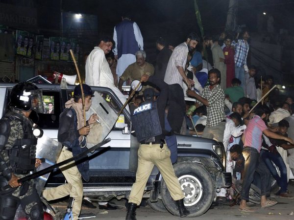 Police use force to disperse supporters of former prime minister Nawaz Sharif who gathered to see him in Lahore, Pakistan, Friday, July 13, 2018. Sharif returned late Friday from London along with his daughter, Maryam, to face a 10-year prison sentence on corruption charges, anti-corruption officials said. Maryam Sharif faces seven years in jail. PTI photo Police use force to disperse supporters of former prime minister Nawaz Sharif who gathered to see him in Lahore, Pakistan, Friday, July 13, 2018. Sharif returned late Friday from London along with his daughter, Maryam, to face a 10-year prison sentence on corruption charges, anti-corruption officials said. Maryam Sharif faces seven years in jail. PTI photo