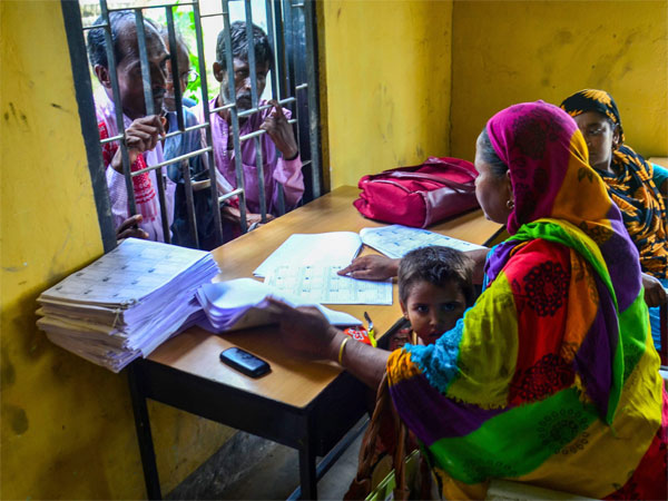 People wait to check their names on the final draft of the National Register of Citizens (NRC) after it was released, at NRC Seva Kendra, Goroimari in Kamrup district of Assam People wait to check their names on the final draft of the National Register of Citizens (NRC) after it was released, at NRC Seva Kendra, Goroimari in Kamrup district of Assam