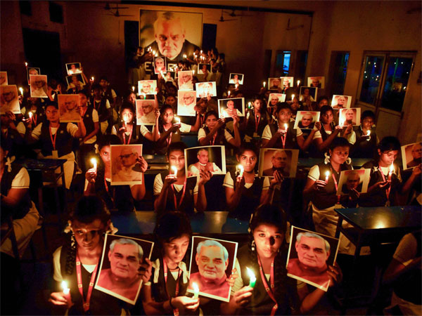 Students participate in a candlelight vigil to pay tribute to former prime minister Atal Bihari Vajpayee Students participate in a candlelight vigil to pay tribute to former prime minister Atal Bihari Vajpayee