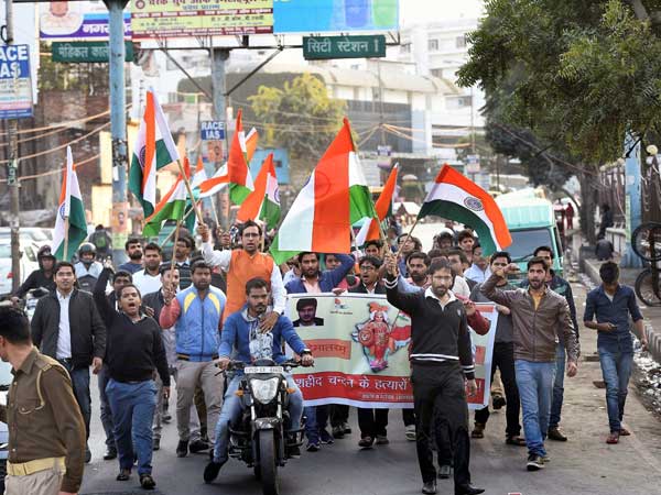 Youth protesting Kasganj against Chandan's killing