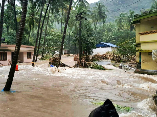 A view of a residential area following a flash flood, triggered by heavy rains, at Kodencheri in Kozhikode district of Kerala A view of a residential area following a flash flood, triggered by heavy rains, at Kodencheri in Kozhikode district of Kerala