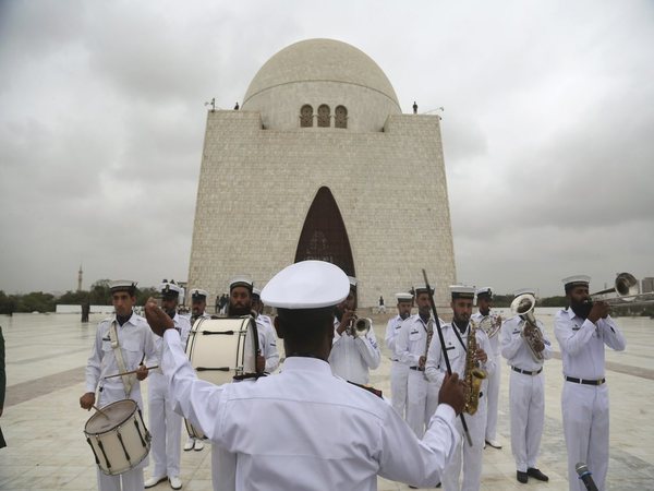 Soldiers of Pakistan Navy play the national anthem at the mausoleum of Muhammad Ali Jinnah, founder of Pakistan, to celebrate the Independence Day in Karachi, Pakistan (Image credit - PTI) Soldiers of Pakistan Navy play the national anthem at the mausoleum of Muhammad Ali Jinnah, founder of Pakistan, to celebrate the Independence Day in Karachi, Pakistan (Image credit - PTI)