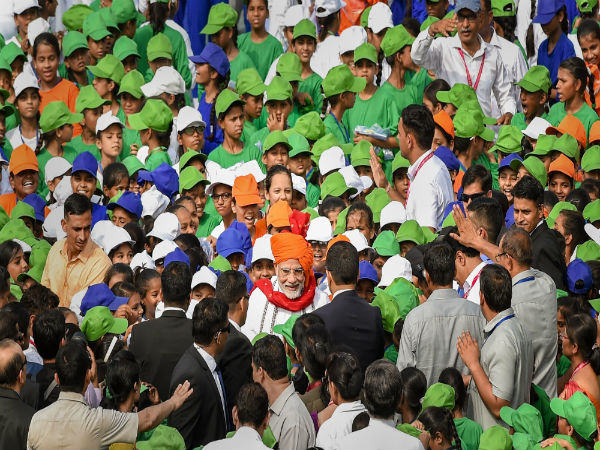 Children jostle to meet, interact with PM Modi at Red Fort Children jostle to meet, interact with PM Modi at Red Fort