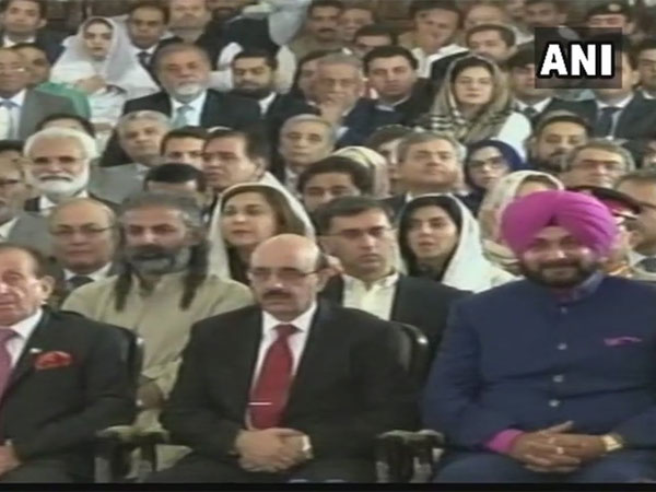 Navjot Singh Sidhu seated next to President of PoK at Imran Khans oath taking ceremony. Courtesy: ANI news Navjot Singh Sidhu seated next to President of PoK at Imran Khans oath taking ceremony. Courtesy: ANI news