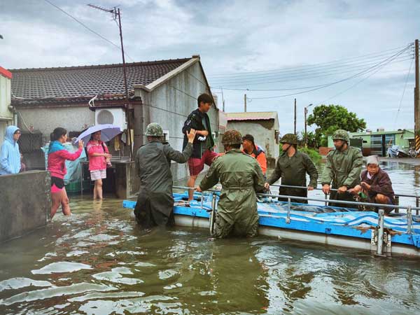 Thousands evacuated as Taiwan floods leave six dead Thousands evacuated as Taiwan floods leave six dead