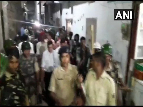 Brajesh Thakurs son being taken into custody Brajesh Thakurs son being taken into custody