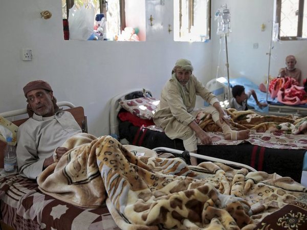 Men are treated for suspected cholera infection Men are treated for suspected cholera infection
