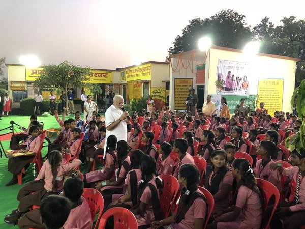 Modi interacting with school children