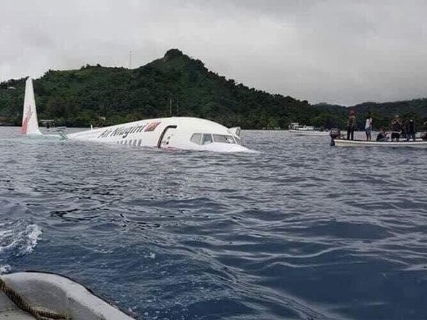 Air Niugini plane overshoots runway in Micronesia, ditches into Pacific Lagoon Air Niugini plane overshoots runway in Micronesia, ditches into Pacific Lagoon