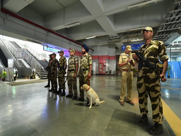 CISF personnel stand guard CISF personnel stand guard