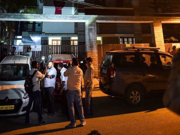 Media outside the Amnesty International office building, where Enforcement directorate (ED) conducted raid in connection with a foreign exchange contravention case against the human rights watchdog, in Bengaluru, Thursday, Oct 25, 2018. PTI file photo Media outside the Amnesty International office building, where Enforcement directorate (ED) conducted raid in connection with a foreign exchange contravention case against the human rights watchdog, in Bengaluru, Thursday, Oct 25, 2018. PTI file photo