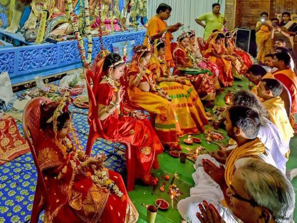 Devotees perform 'Kumari Puja Devotees perform 'Kumari Puja
