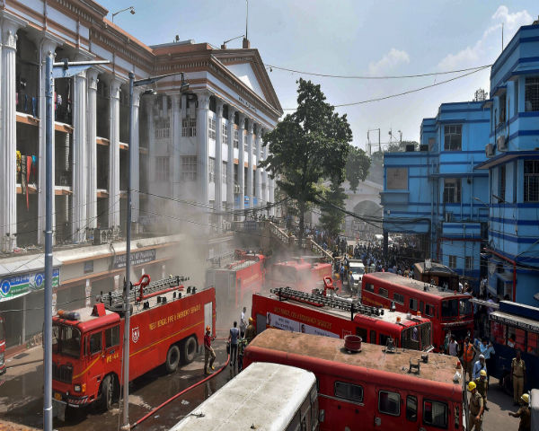 Fire fighters douse a fire