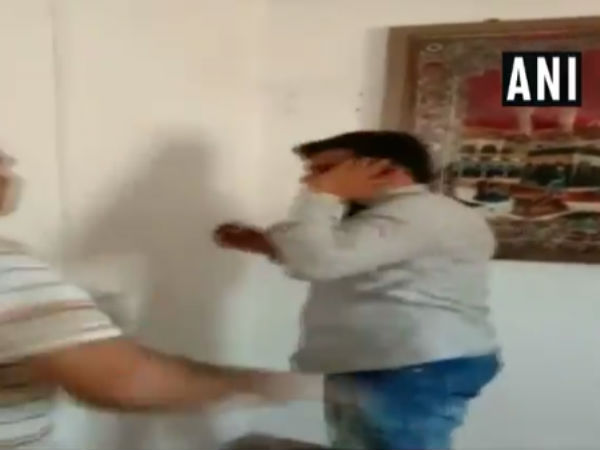 Ola driver thrashed by protesters Ola driver thrashed by protesters