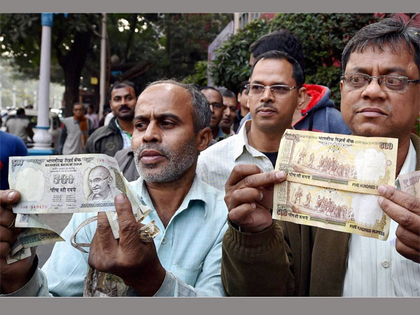 Disappointed people shows their old currency notes which they could not exchange at the RBI office closed for the day in Kolkata (2016-12-31). PTI file photo Disappointed people shows their old currency notes which they could not exchange at the RBI office closed for the day in Kolkata (2016-12-31). PTI file photo
