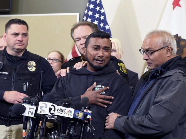 : Reggie Singh, brother of Newman Police officer Ronil Singh is overcome with emotion as he thanks law enforcement after the arrest of suspect Gustavo Perez Arriaga and others Friday, Dec. 28, 2018 during a news conference at the Stanislaus County Sheriffs department in Modesto. PTI file photo : Reggie Singh, brother of Newman Police officer Ronil Singh is overcome with emotion as he thanks law enforcement after the arrest of suspect Gustavo Perez Arriaga and others Friday, Dec. 28, 2018 during a news conference at the Stanislaus County Sheriffs department in Modesto. PTI file photo