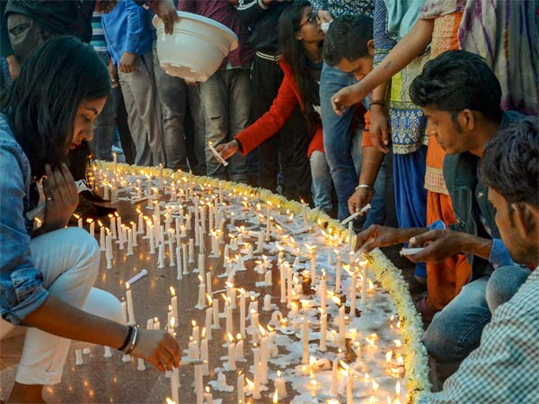 People light candles to pay tribute to CRPF soldiers who lost their lives in Pulwama terror attack, at Connaught Place in New Delhi, Sunday, Feb 17, 2019. (PTI Photo) People light candles to pay tribute to CRPF soldiers who lost their lives in Pulwama terror attack, at Connaught Place in New Delhi, Sunday, Feb 17, 2019. (PTI Photo)