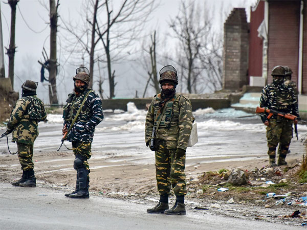 Security personnel stand guard at the site of suicide bomb attack at Lethpora area, in Pulwama district of south Kashmir Security personnel stand guard at the site of suicide bomb attack at Lethpora area, in Pulwama district of south Kashmir