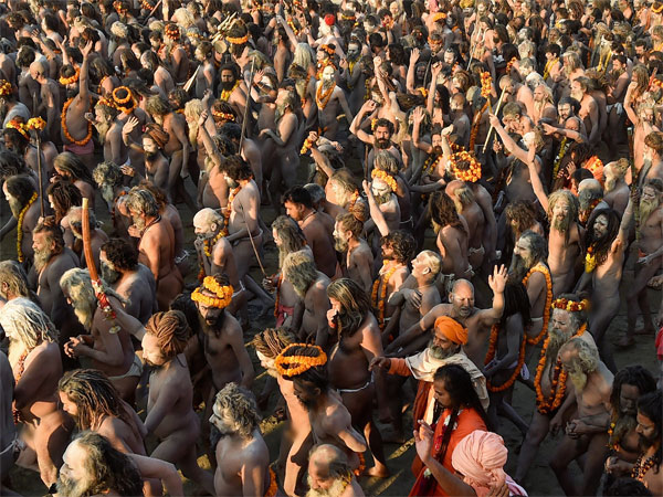 Juna Akhara Sadhus arrive for holy dip on the auspicious Makar Sankranti day
