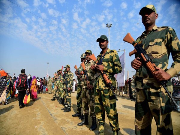 Paramilitary forces stand guard at Sangam on the auspicious 'Maghi Purnima' day