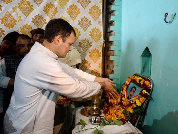 Rahul Gandhi pays tribute at martyr Pradeep Kumar's house. Rahul Gandhi pays tribute at martyr Pradeep Kumar's house.