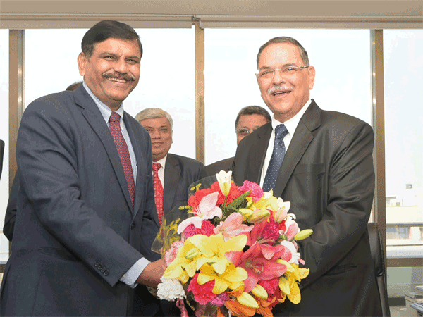 Interim Central Bureau of Investigation (CBI) chief M Nageswara Rao presents a bouquet to the newly-appointed CBI Chief Rishi Kumar Shukla as he takes charge at CBI headquarters, in New Delhi Interim Central Bureau of Investigation (CBI) chief M Nageswara Rao presents a bouquet to the newly-appointed CBI Chief Rishi Kumar Shukla as he takes charge at CBI headquarters, in New Delhi
