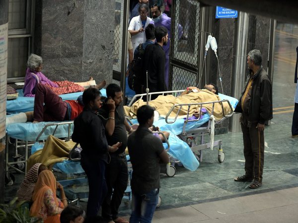 Patients brought out of the building after a fire broke out at AIIMS Trauma Centre, in New Delhi, Sunday, March,24,2019. PTI Photo Patients brought out of the building after a fire broke out at AIIMS Trauma Centre, in New Delhi, Sunday, March,24,2019. PTI Photo