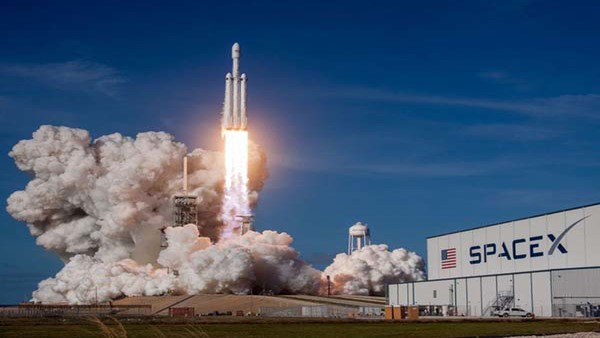 Falcon Heavy rocket soars towards sky with 24 research satellites Falcon Heavy rocket soars towards sky with 24 research satellites