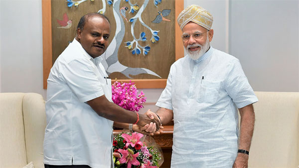 Prime Minister Narendra Modi being greeted by Chief Minister of Karnataka H.D. Kumaraswamy during a meeting, New Delhi Prime Minister Narendra Modi being greeted by Chief Minister of Karnataka H.D. Kumaraswamy during a meeting, New Delhi