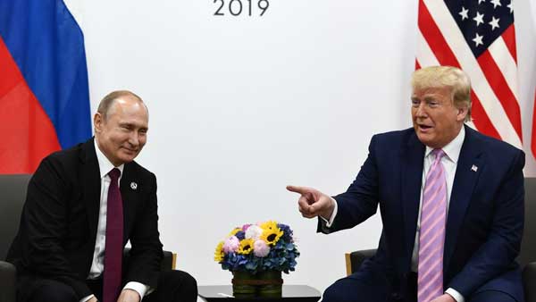 Dont meddle in the election, please: Smiling Trump tells Putin Dont meddle in the election, please: Smiling Trump tells Putin