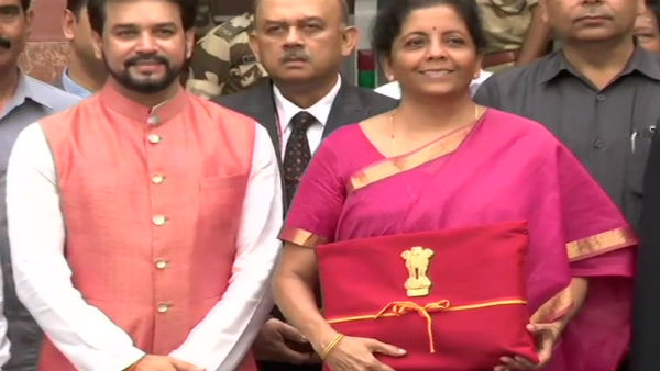 Sitharaman keeping budget documents in four fold red cloth instead of a briefcase Sitharaman keeping budget documents in four fold red cloth instead of a briefcase