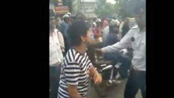 Drunk woman, her friend held for misbehaving with Delhi traffic cop Drunk woman, her friend held for misbehaving with Delhi traffic cop