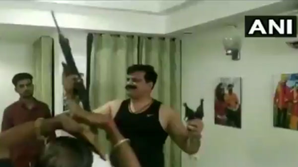 BJP MLA brandishes guns & dances in Gangs of Wasseypur style BJP MLA brandishes guns & dances in Gangs of Wasseypur style