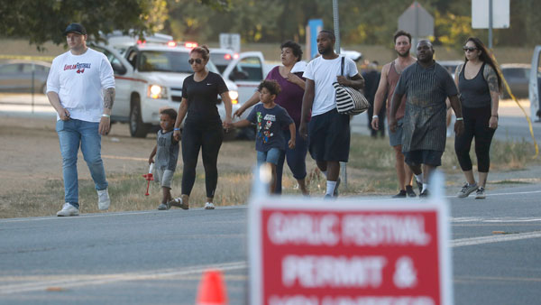 People leave the Gilroy Garlic Festival following a deadly shooting in Gilroy, Calif People leave the Gilroy Garlic Festival following a deadly shooting in Gilroy, Calif