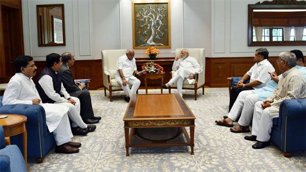 Karnataka Chief Minister B S Yediyurappa meets Prime Minister Narendra Modi Karnataka Chief Minister B S Yediyurappa meets Prime Minister Narendra Modi