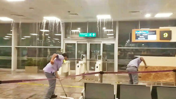 Watch: Rain water gushes in through leaking roof of Bengalurus Kempegowda airport Watch: Rain water gushes in through leaking roof of Bengalurus Kempegowda airport