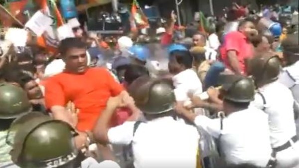 Kolkata turns into battlefield following BJP protest against CESC, police fire water cannons Kolkata turns into battlefield following BJP protest against CESC, police fire water cannons